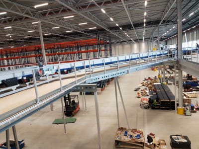 Delivery and installation of mezzanine shelving system. 8